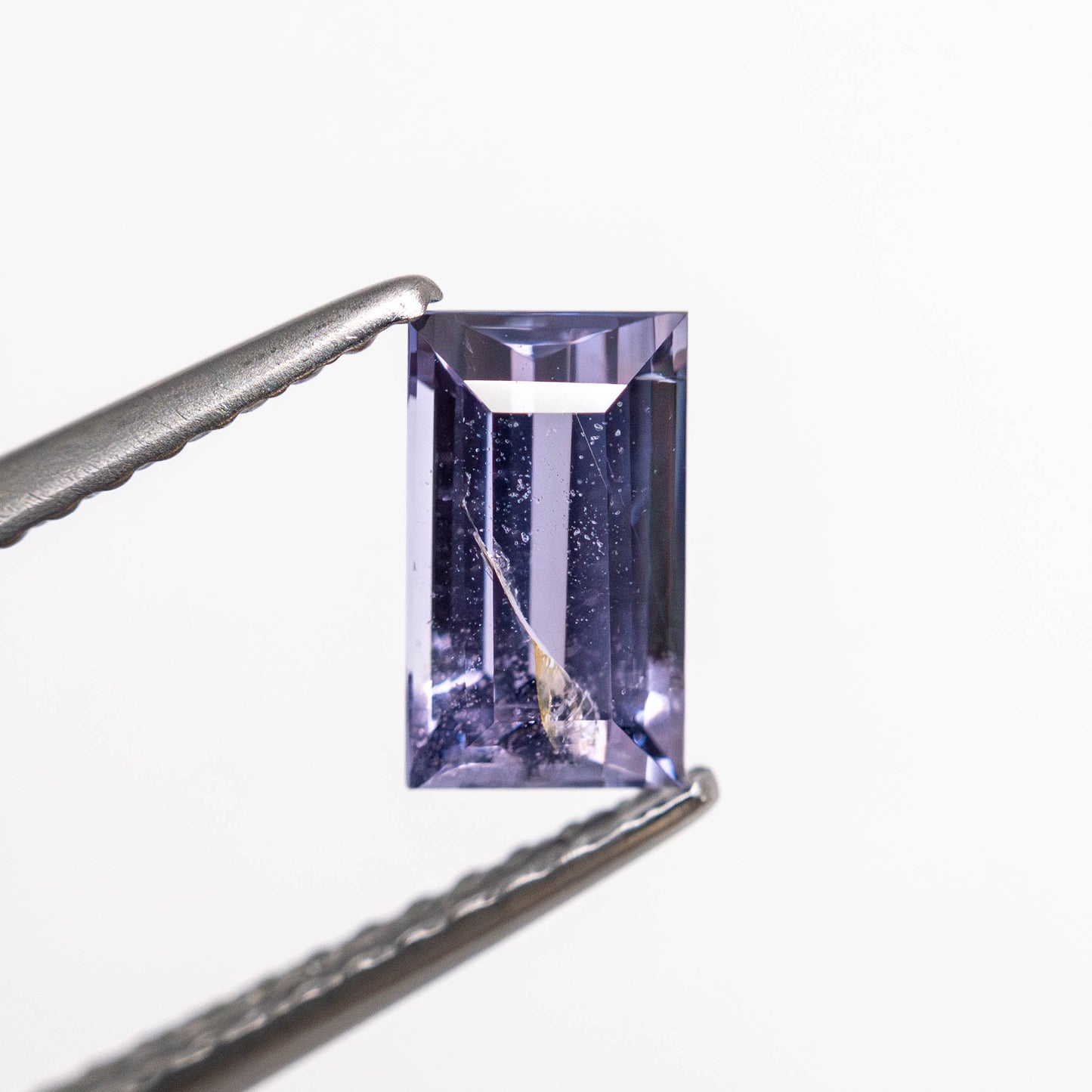 0.88ct 6.88x4.02x3.00mm Baguette Step Cut Sapphire 22744-01