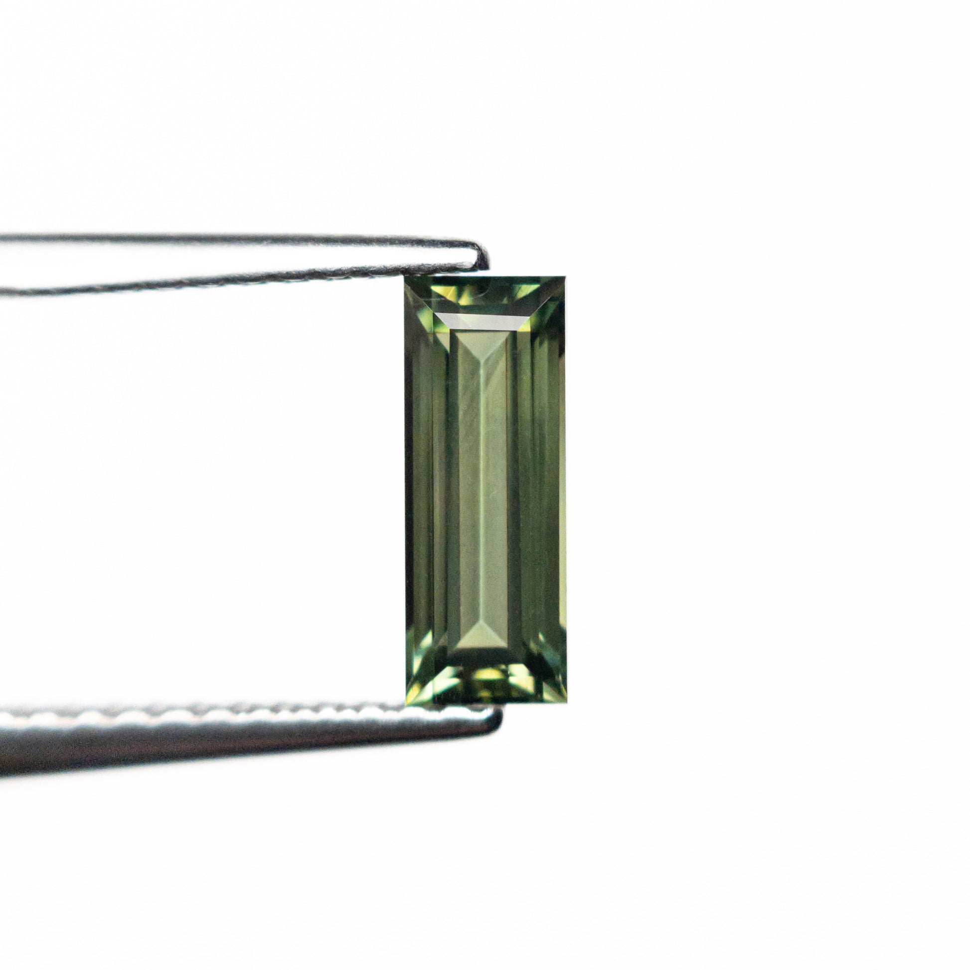 0.85ct 8.45x3.22x2.61mm Rectangle Step Cut Sapphire 25740-03
