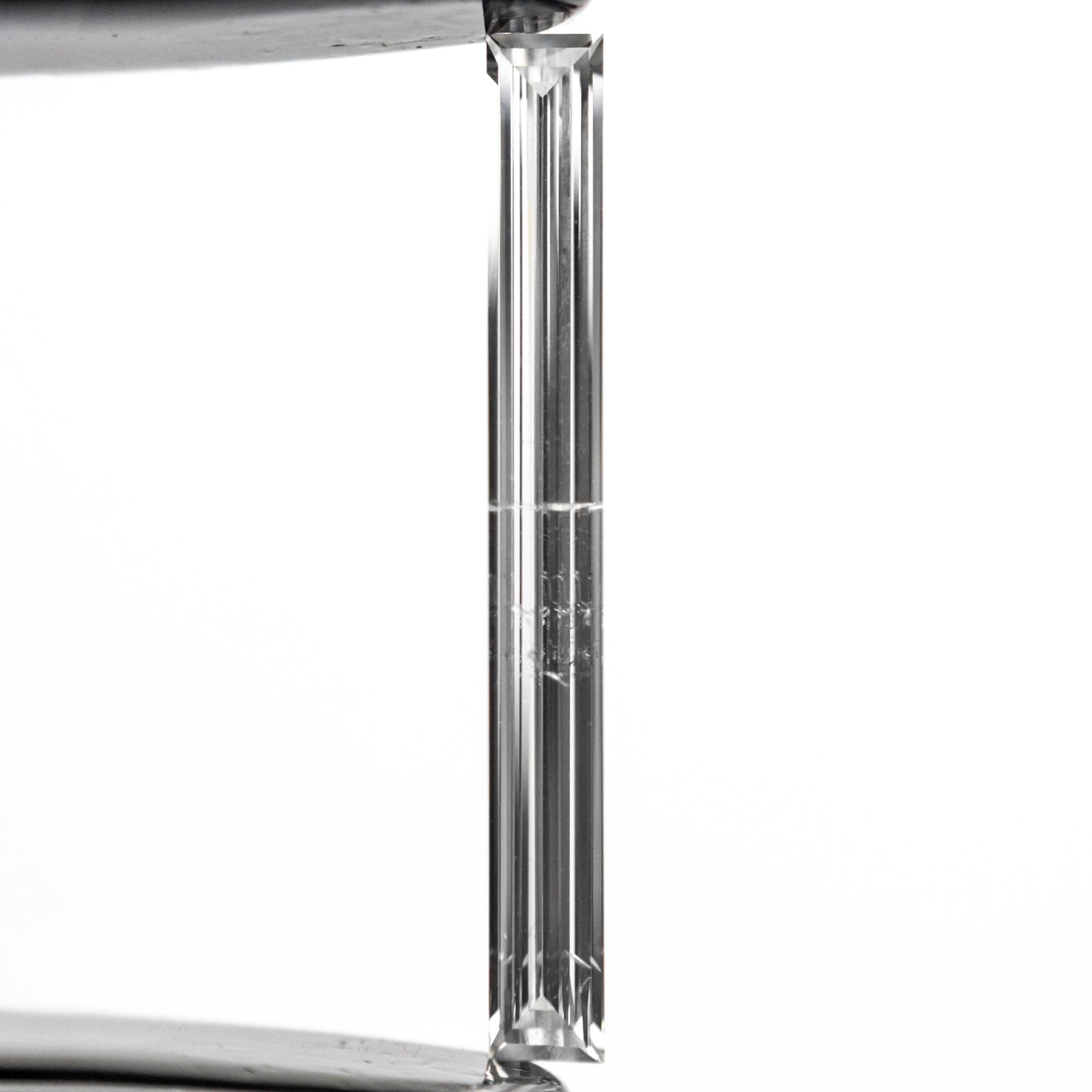 0.52ct 19.44x2.17x1.09mm SI2 E Baguette Step Cut 26545-01