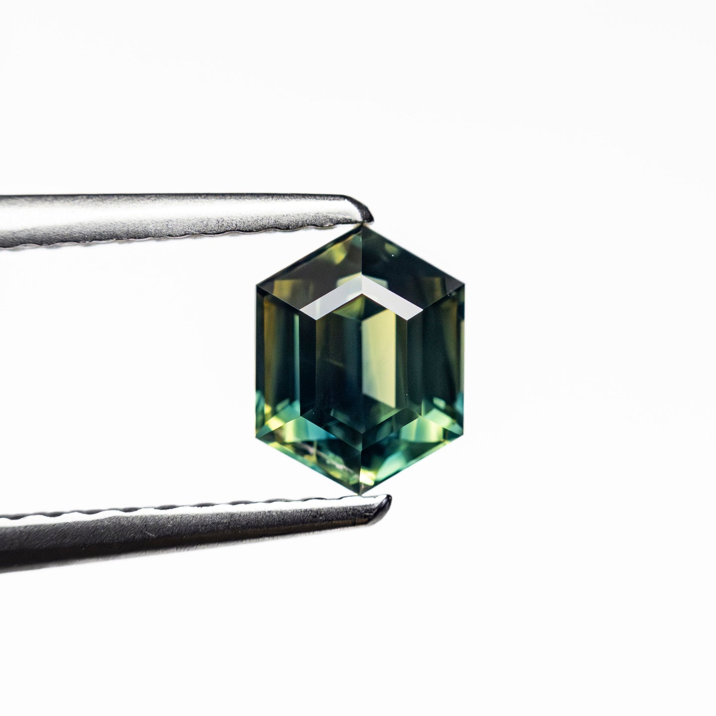 0.97ct 6.36x4.91x3.67mm Hexagon Step Cut Sapphire 27153-01