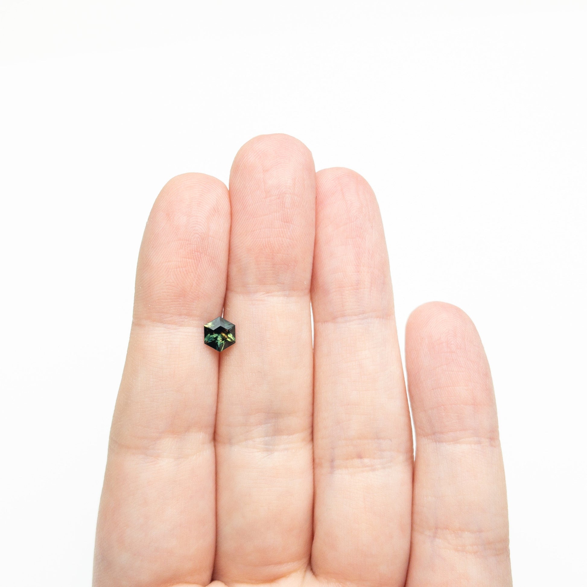 0.71ct 6.01x5.22x3.20mm Hexagon Step Cut Sapphire 27336-06