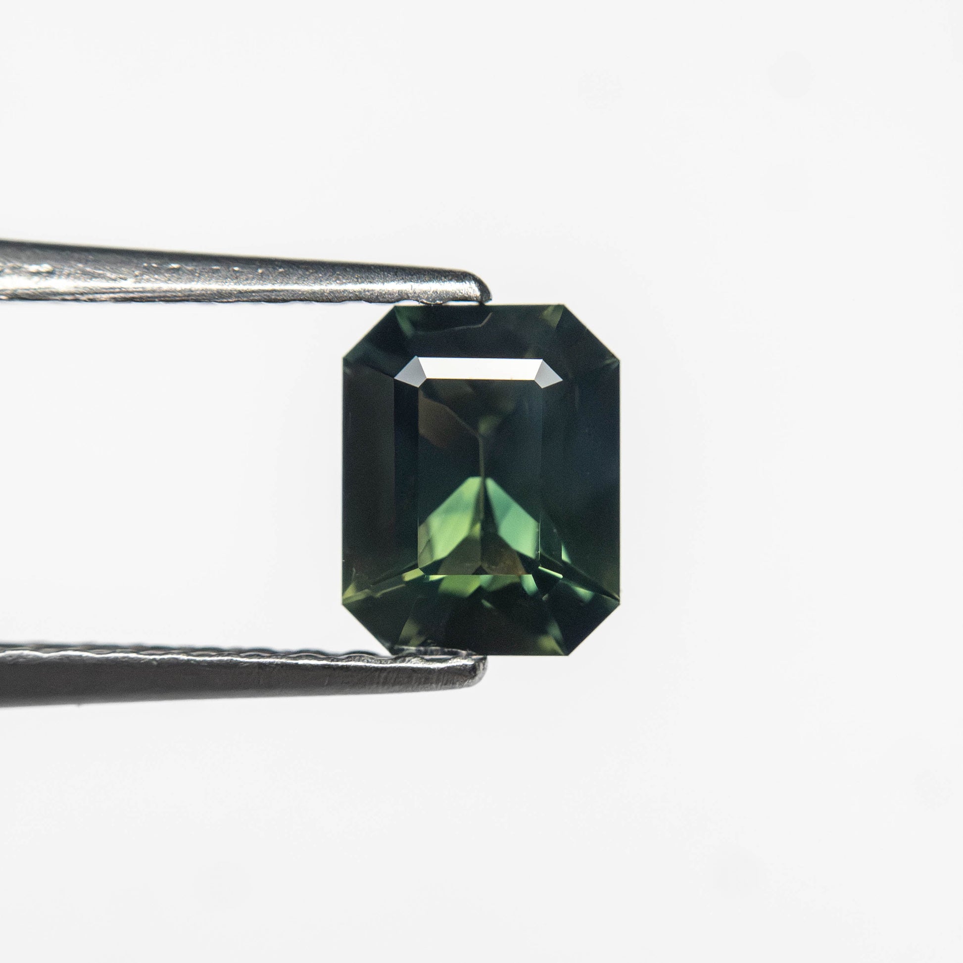 0.69ct 5.89x4.67x2.82mm Cut Corner Rectangle Step Cut Sapphire 27336-28