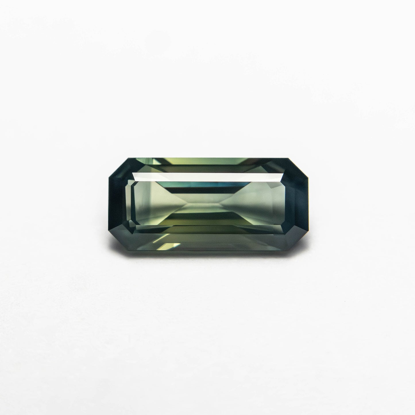 0.71ct 7.78x3.64x2.46mm Cut Corner Rectangle Step Cut Sapphire 27336-53