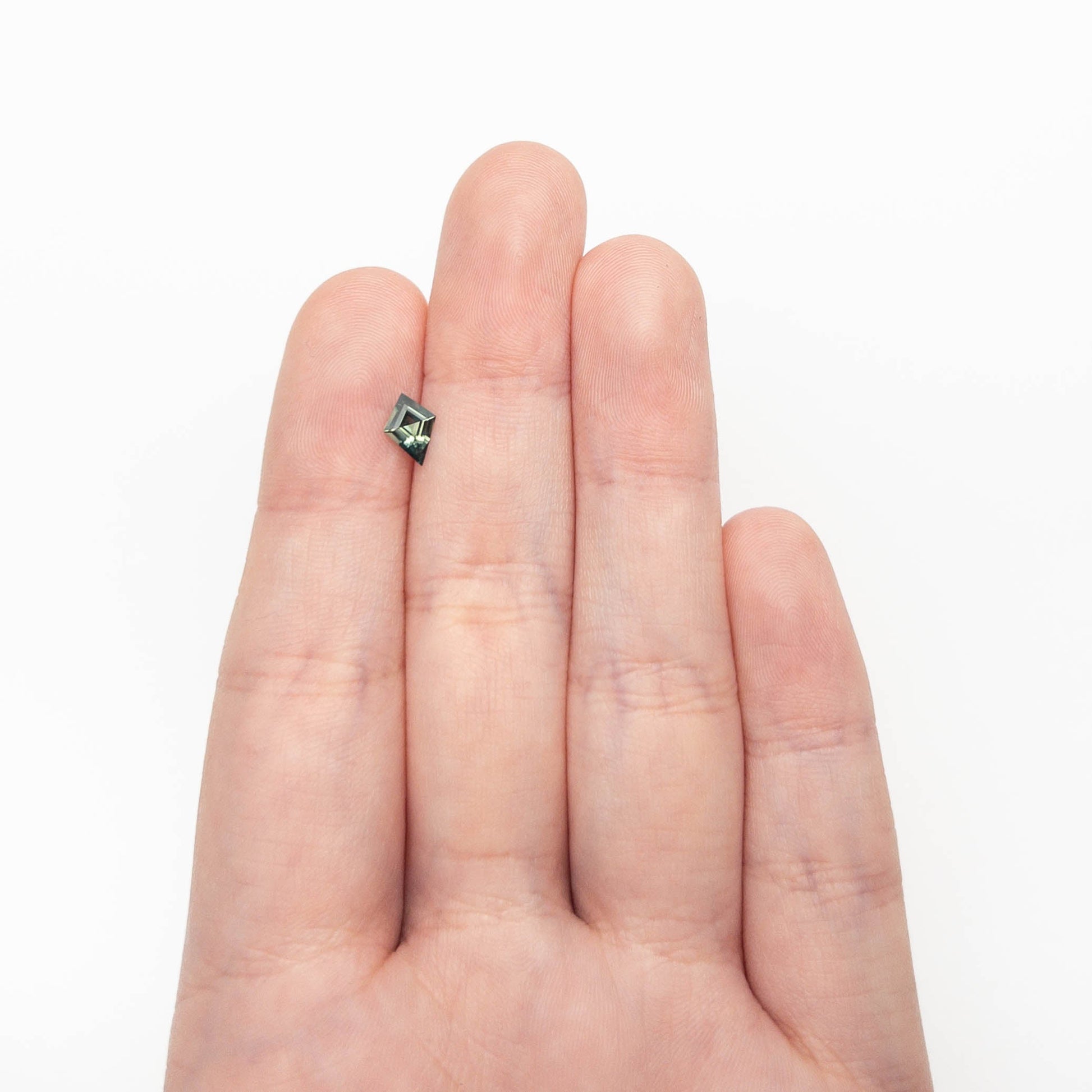 0.54ct 7.68x5.44x2.64mm Kite Step Cut Sapphire 27363-14