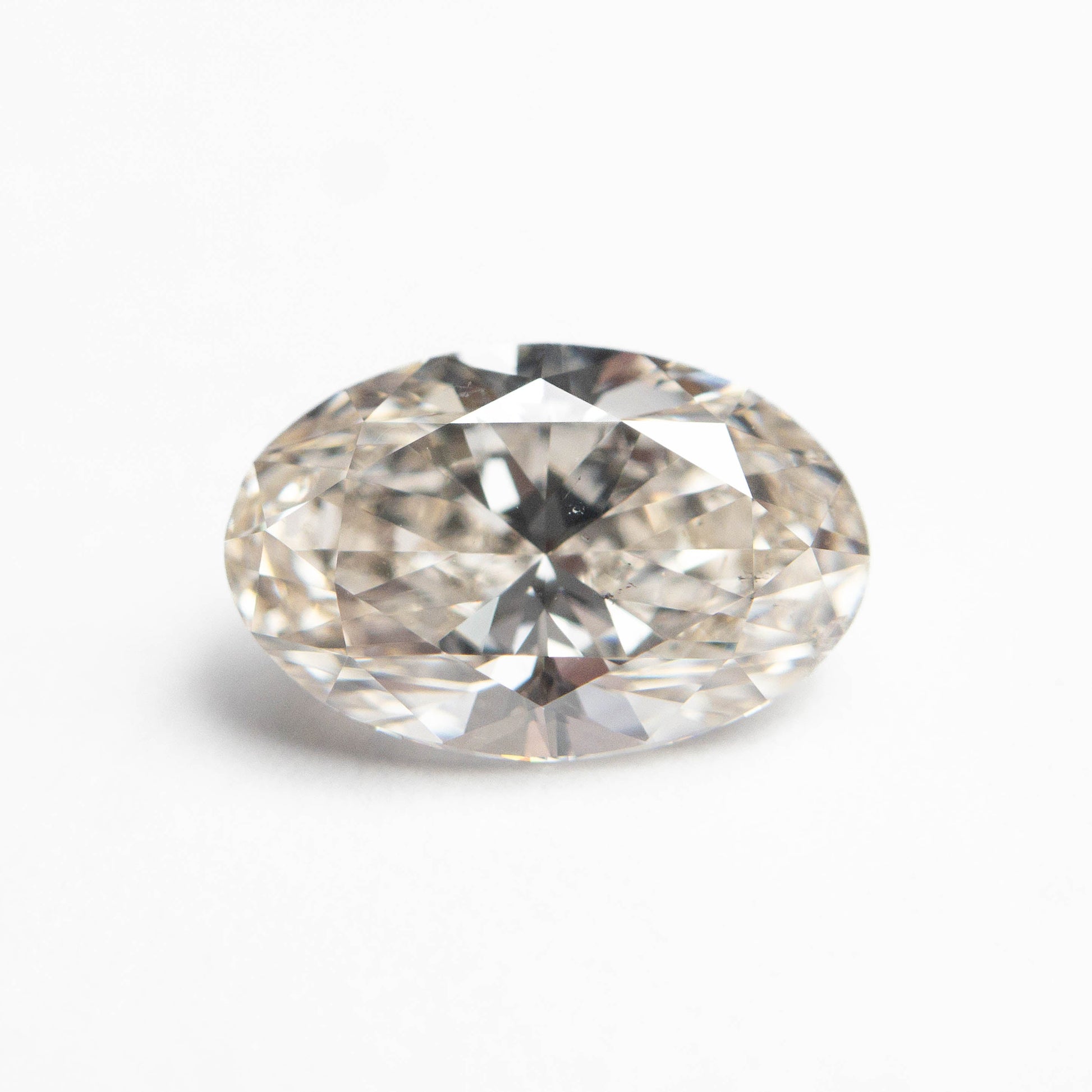 1.50ct 9.27x6.07x3.96mm SI2 K Oval Brilliant 27386-02