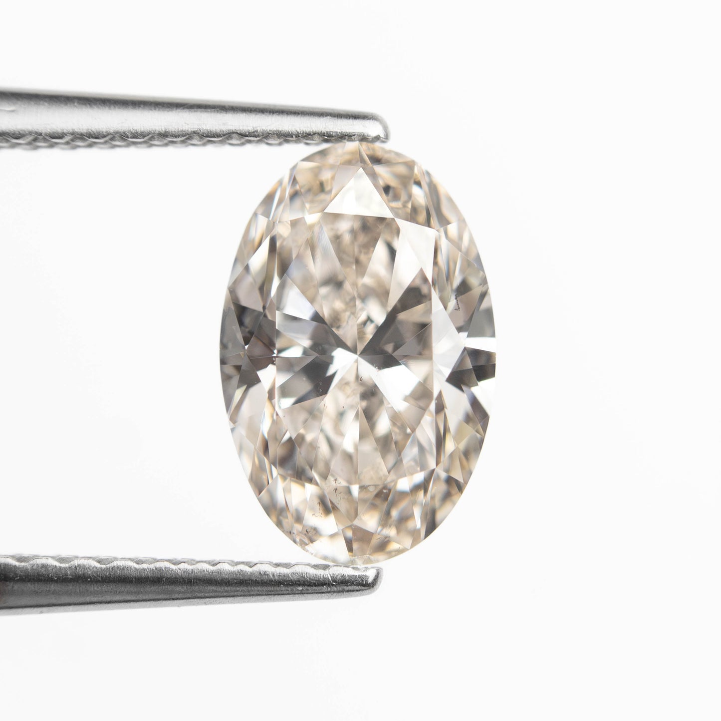 1.50ct 9.27x6.07x3.96mm SI2 K Oval Brilliant 27386-02