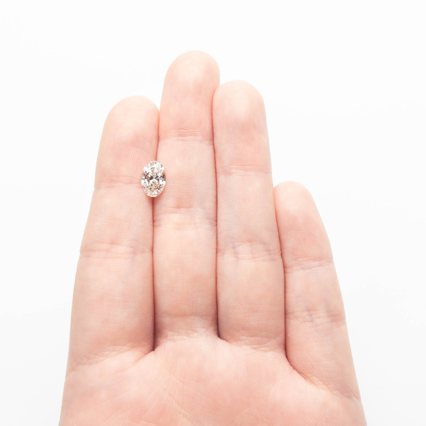 1.50ct 9.27x6.07x3.96mm SI2 K Oval Brilliant 27386-02