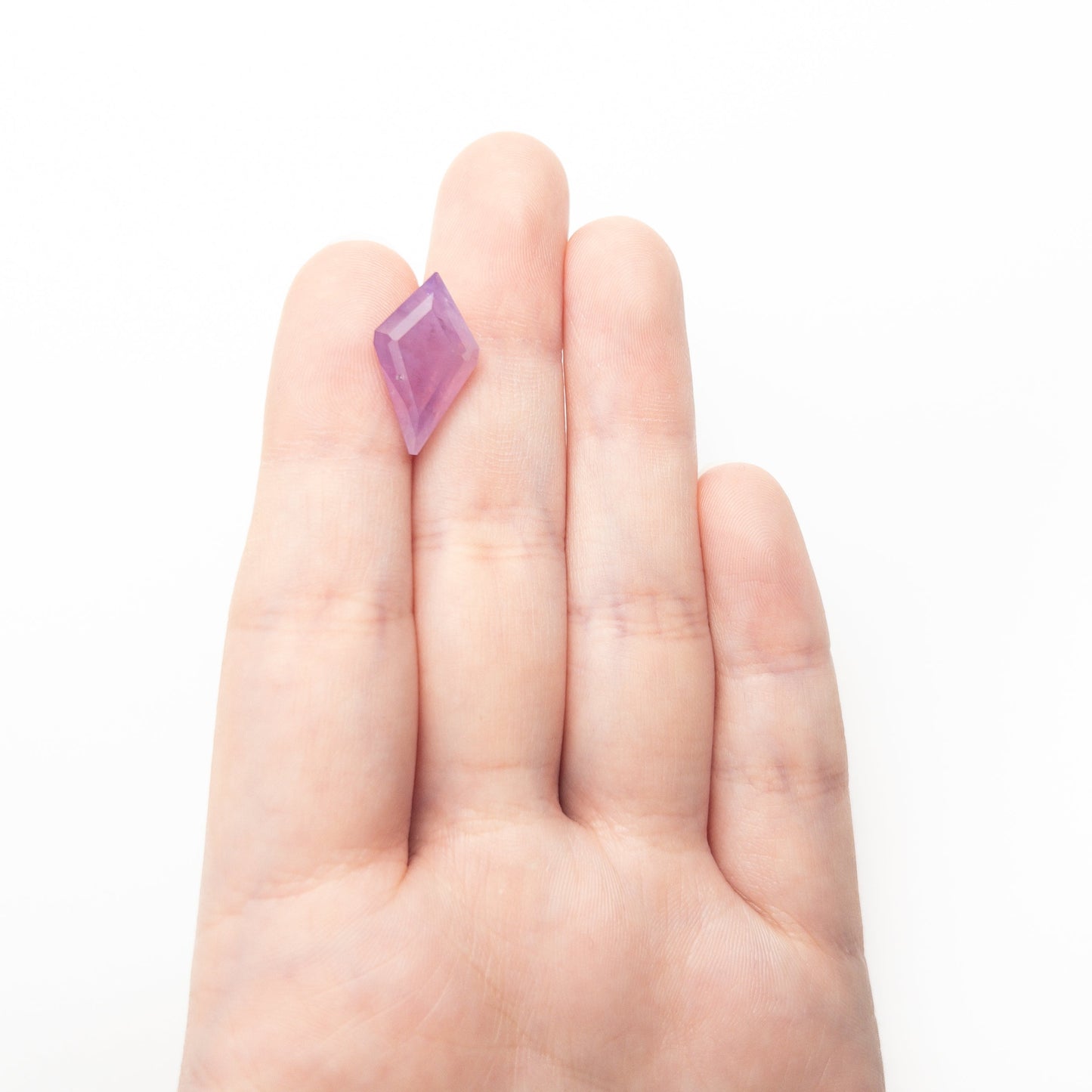 9.86ct 19.38x11.12x7.36mm Kite Step Cut Sapphire 27504-01