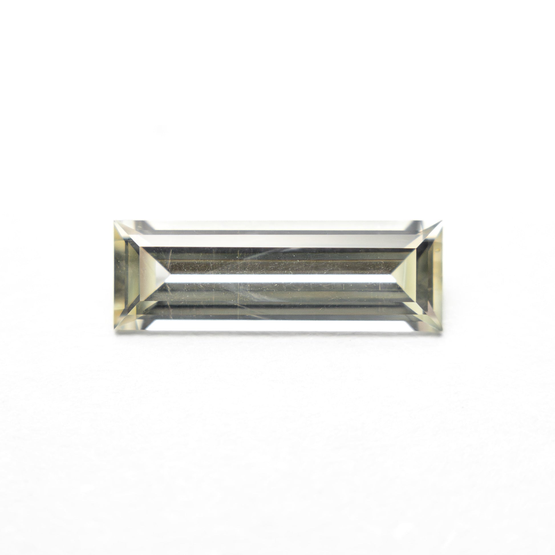 0.84ct 9.95x3.36x2.17mm Baguette Step Cut Sapphire 27719-01